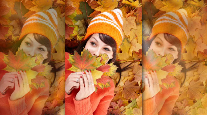 A beautiful woman is happy, playing in the leaves while thinking of what she's thankful for.