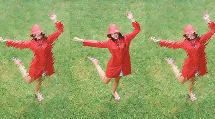 A woman is dancing in the rain because of her confidence.