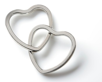 Two silver hearts are forever linked signifying a committed relationship. 