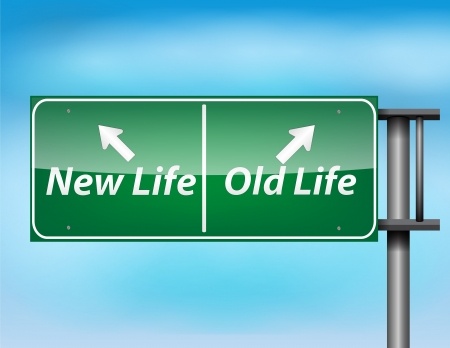 Freeway exit sign showing exits for old life and new life, representing that old habits are hard to break