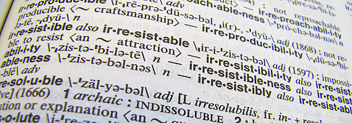 Photos of dictionary showing definition of the word irresistible.